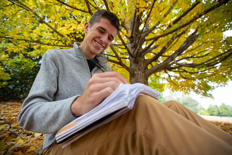 Student studying outdoors