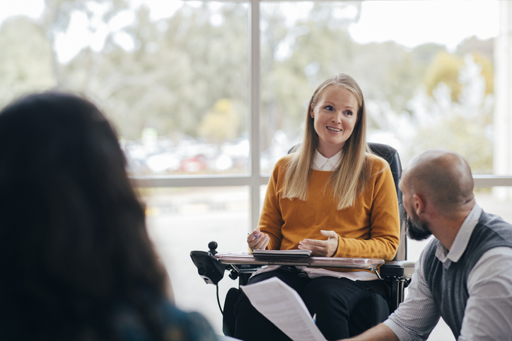 Student presents from wheelchair