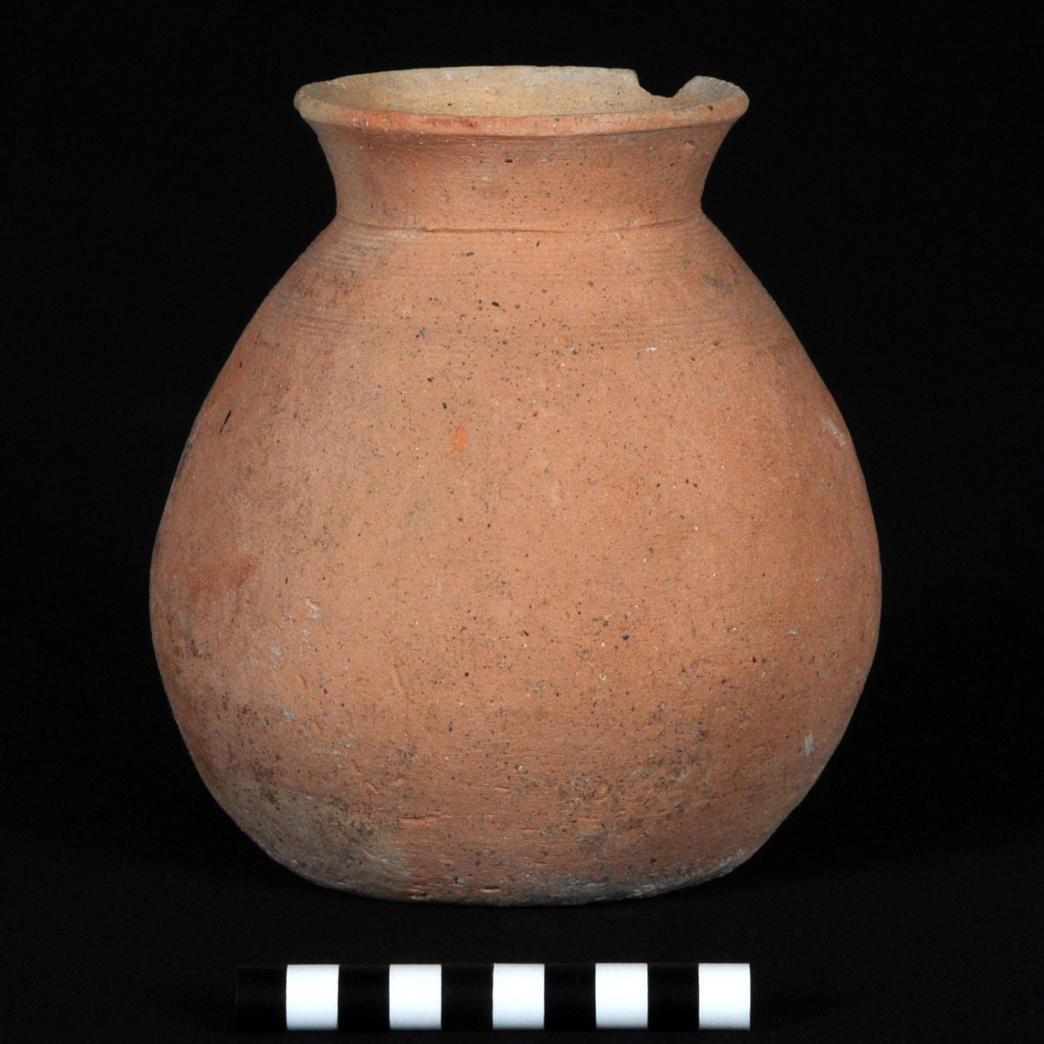a dull orange jar