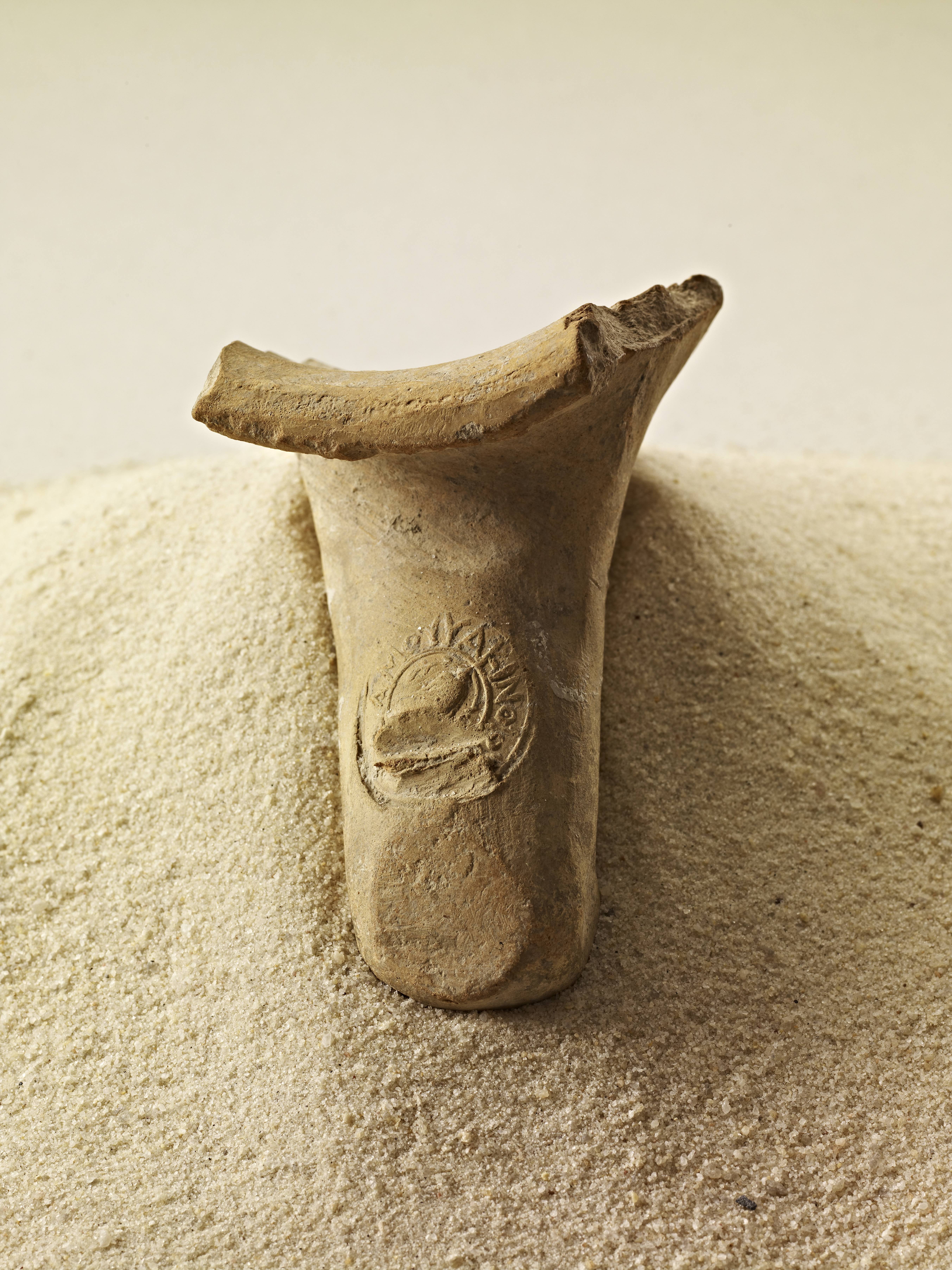 Rhodian amphora handle with an inscription linking it back to a specific winery.