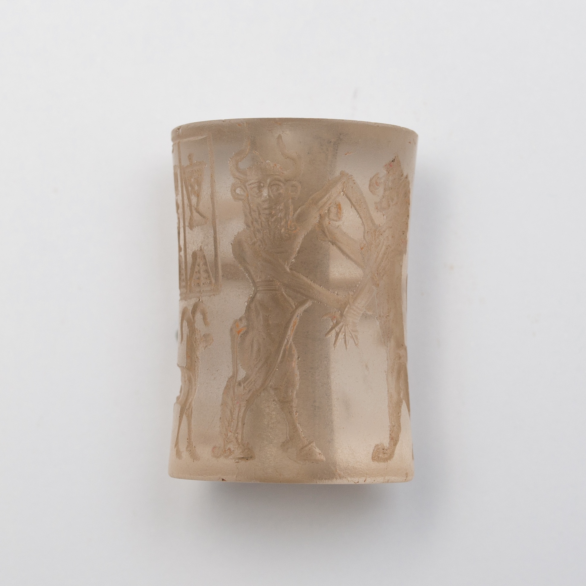 a cylinder seal made out of orange precious stone