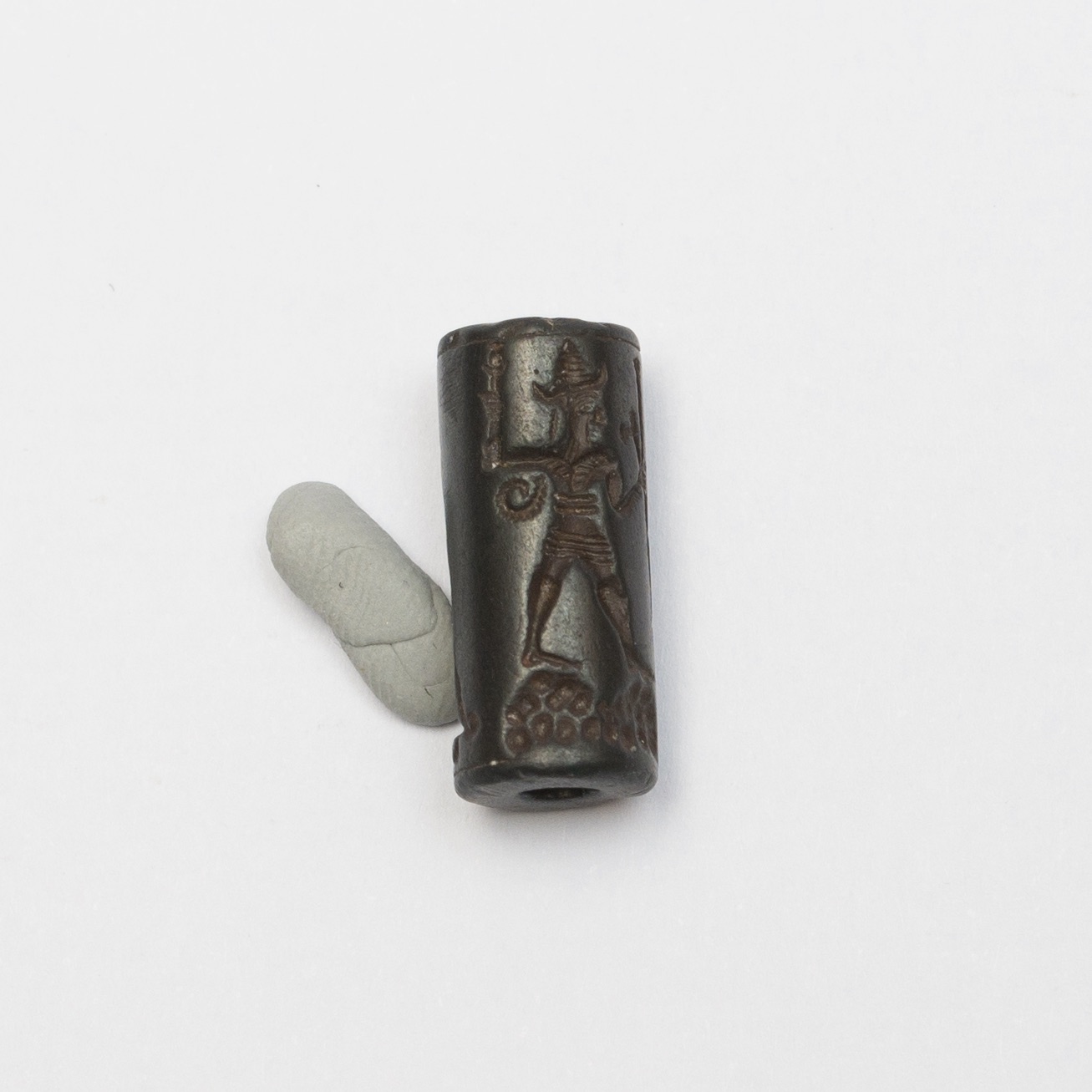 a black cylinder seal