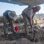 two people working outside