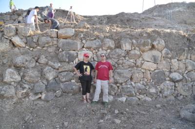 two people posing for photos