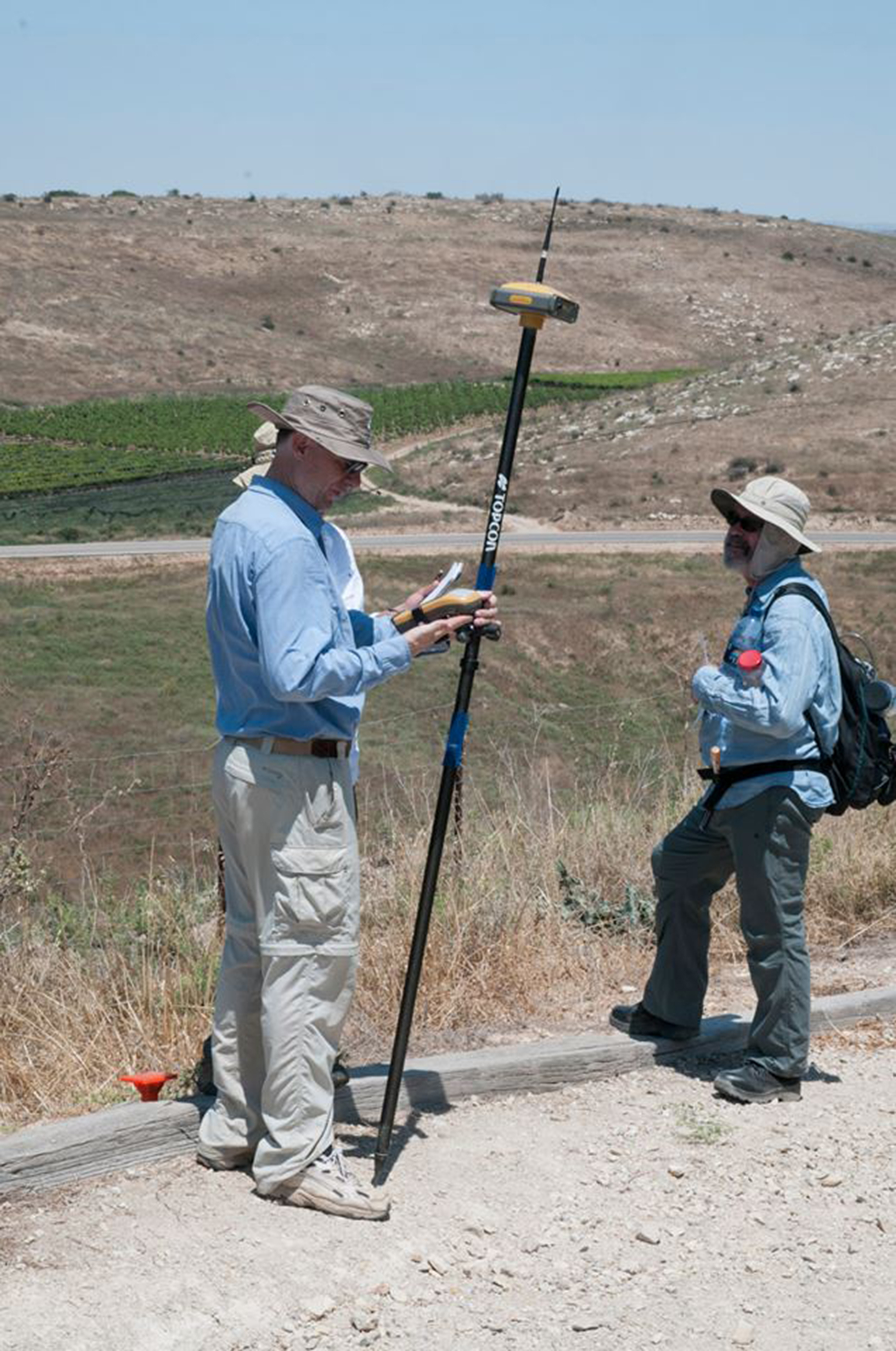 Two people standing outside