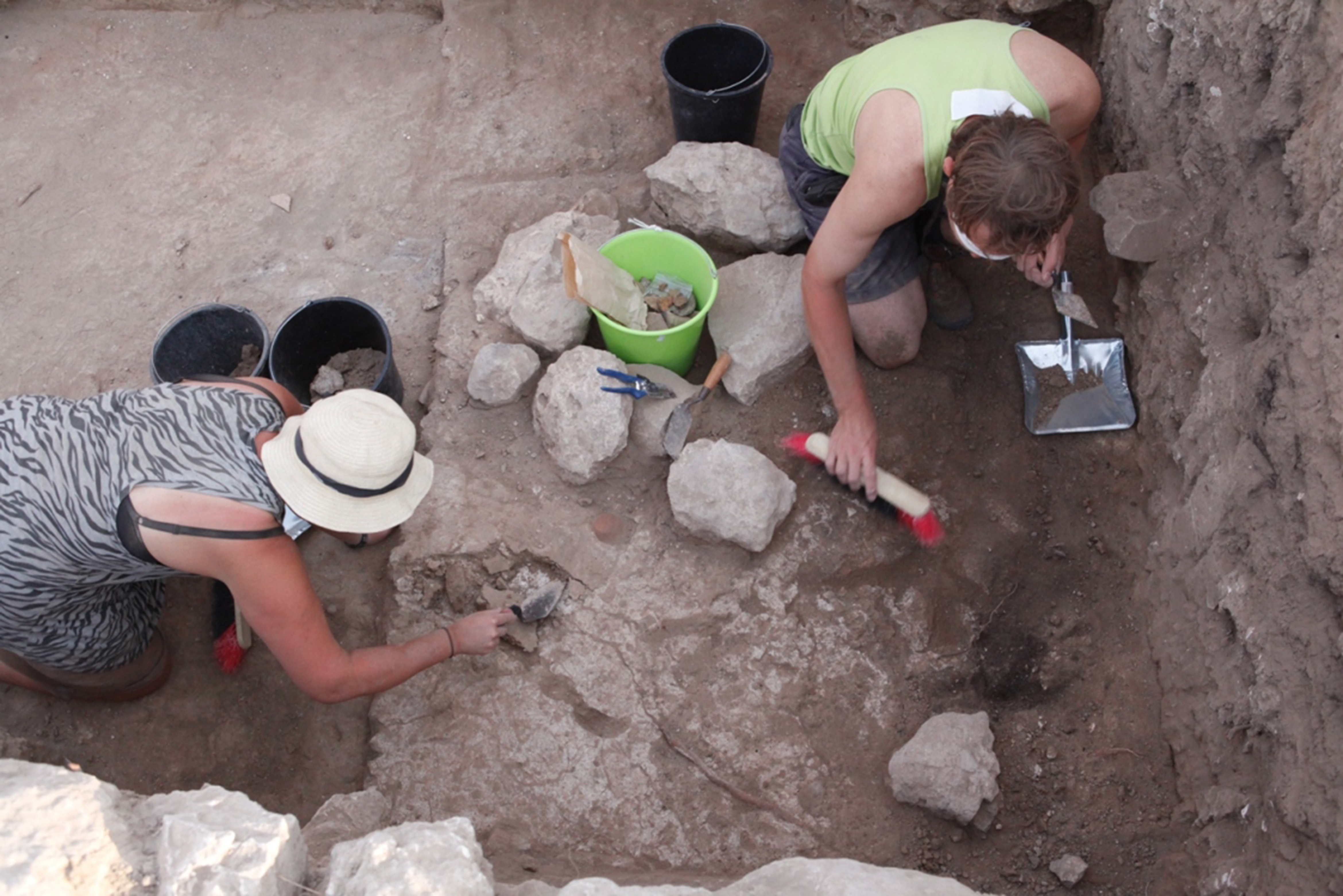 people working with rocks