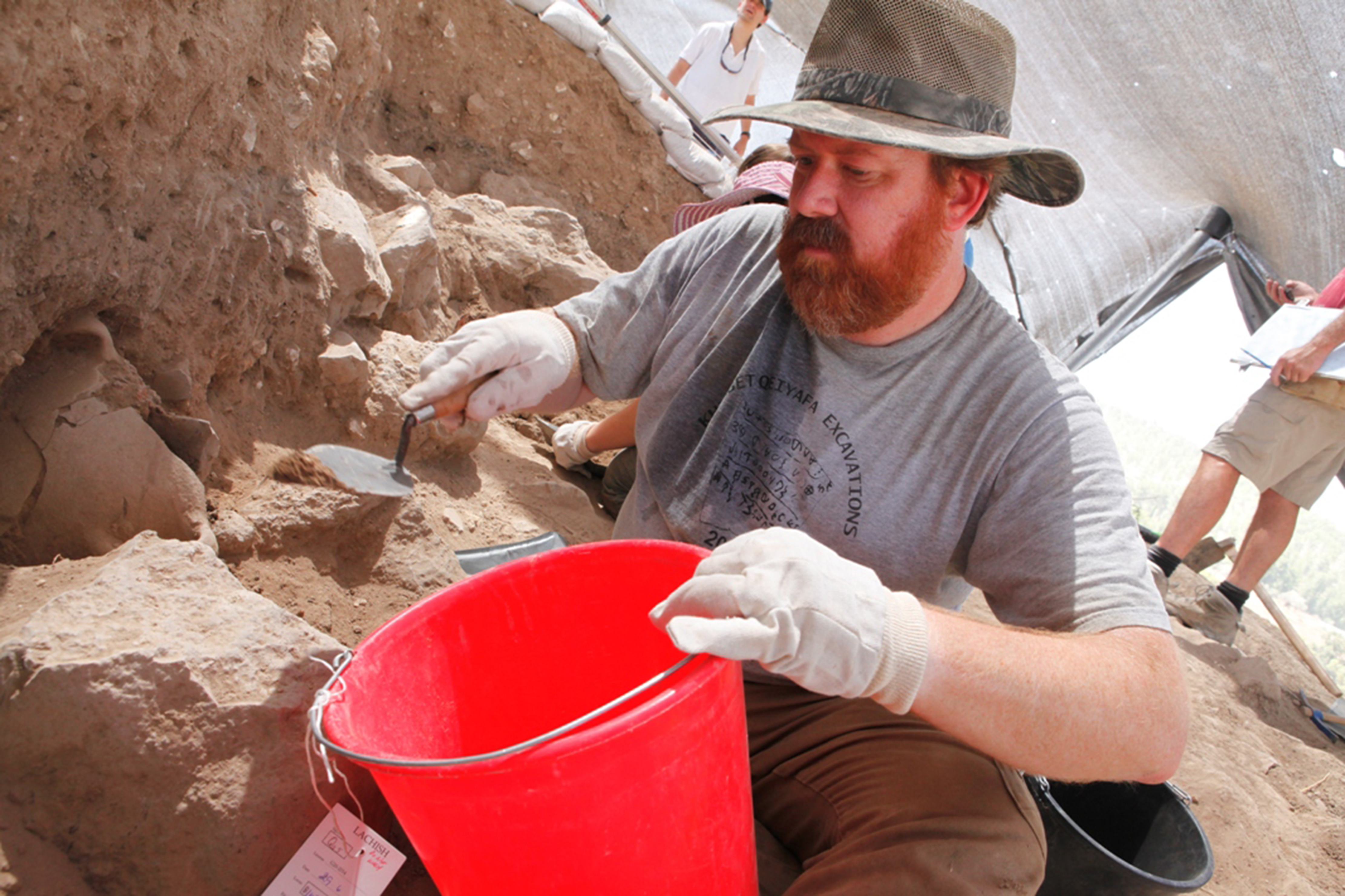 someone working with a bucket