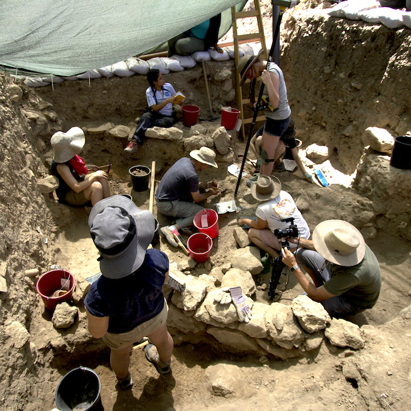 people working with rocks