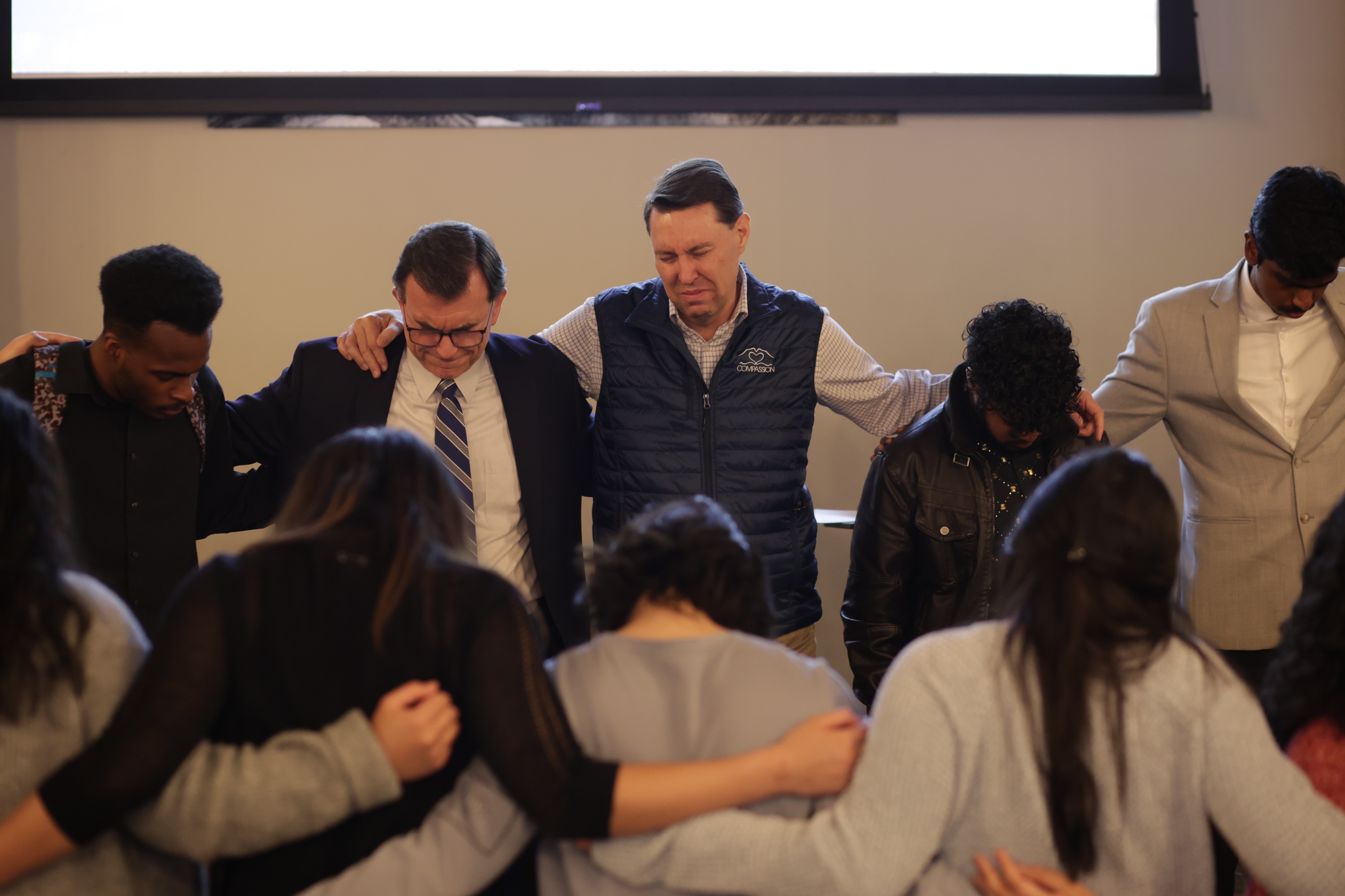 A group of people praying