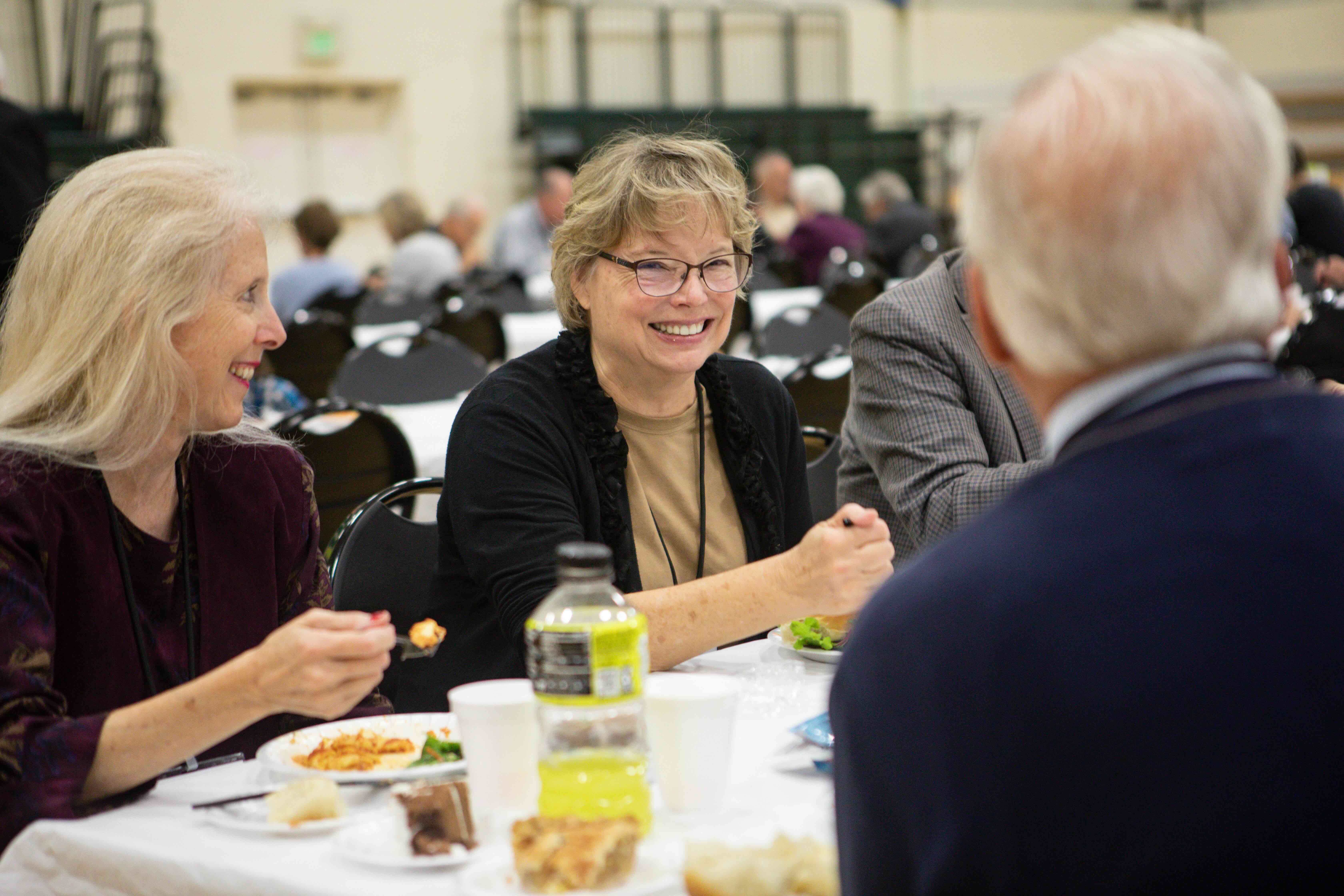 people talking at the table