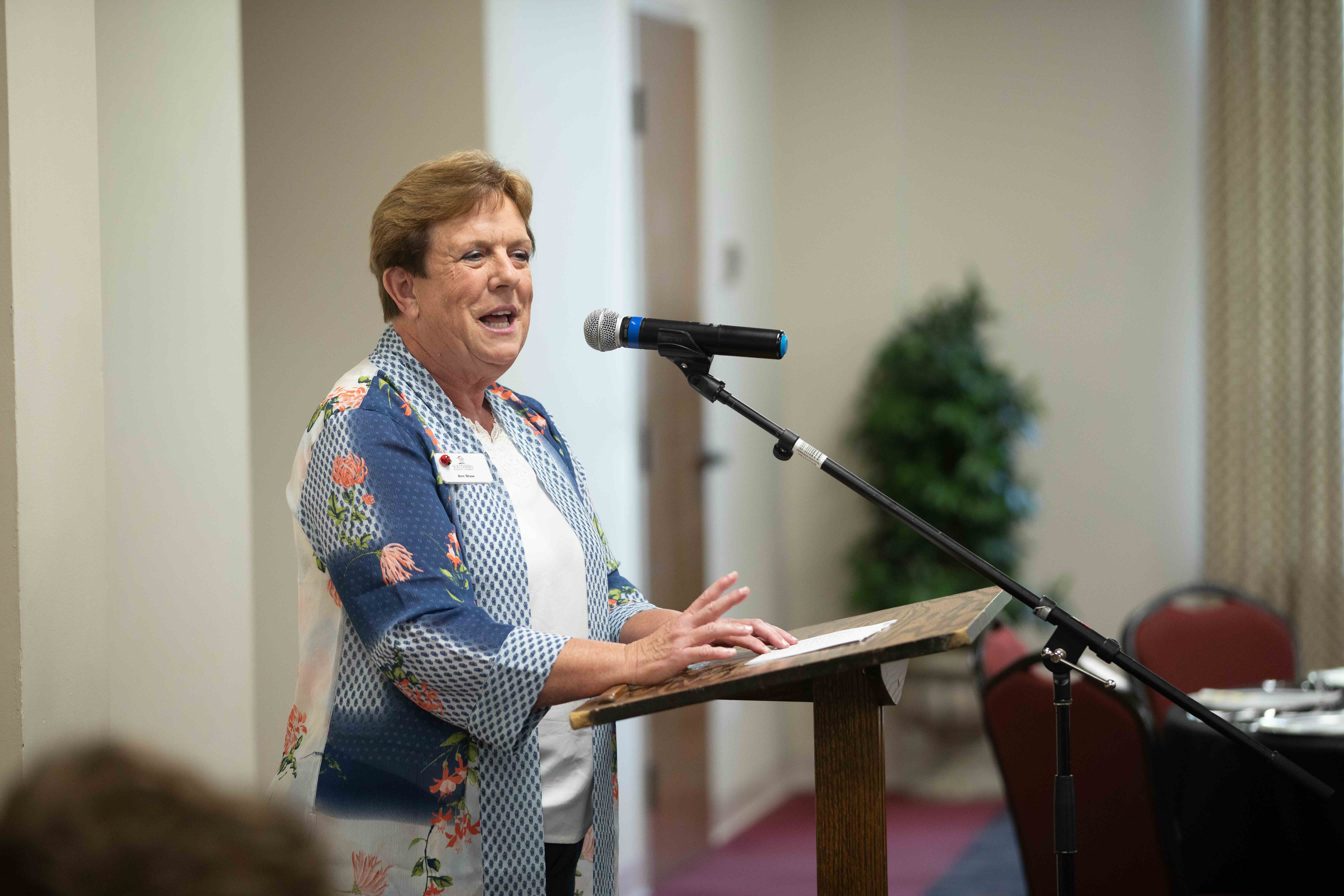 Homecoming Weekend Photo of someone at the podium speaking