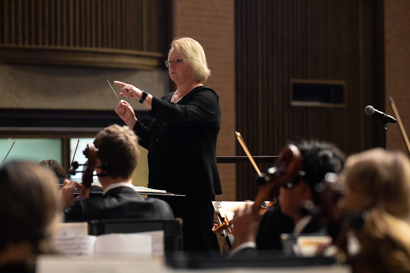 Laurie conduction the Symphony Orchestra