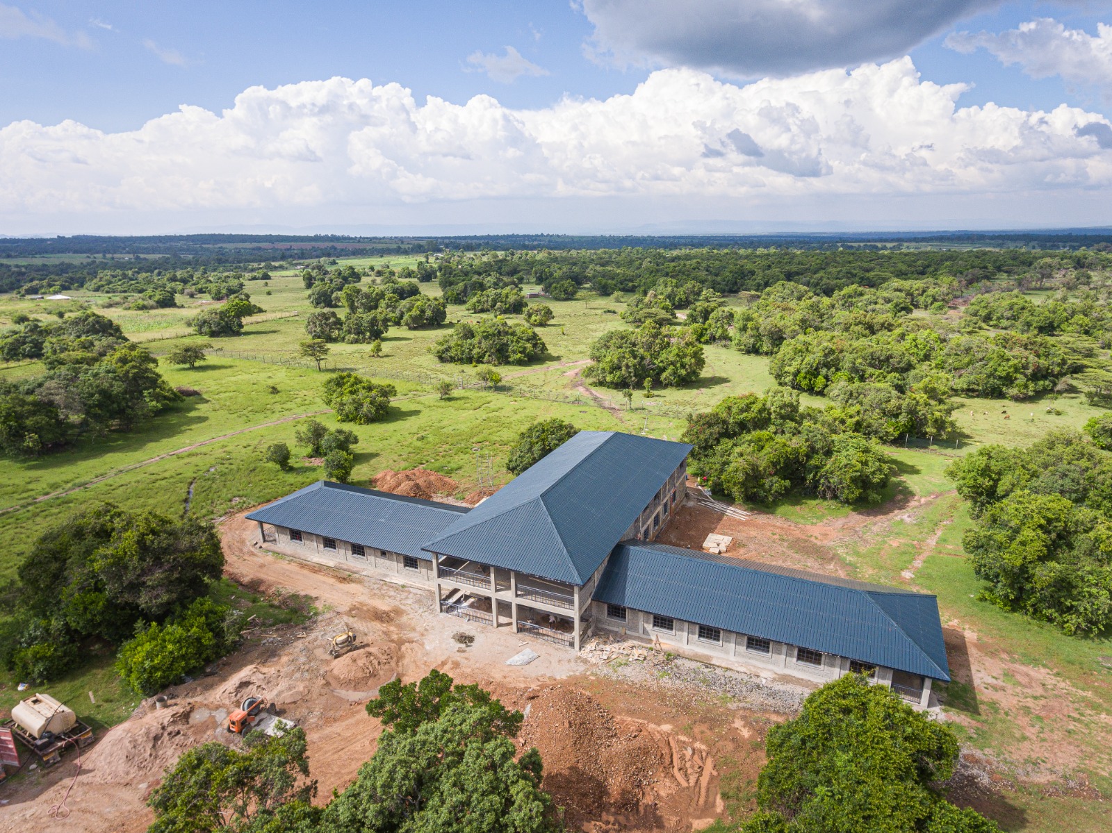 3-wing building on African plain