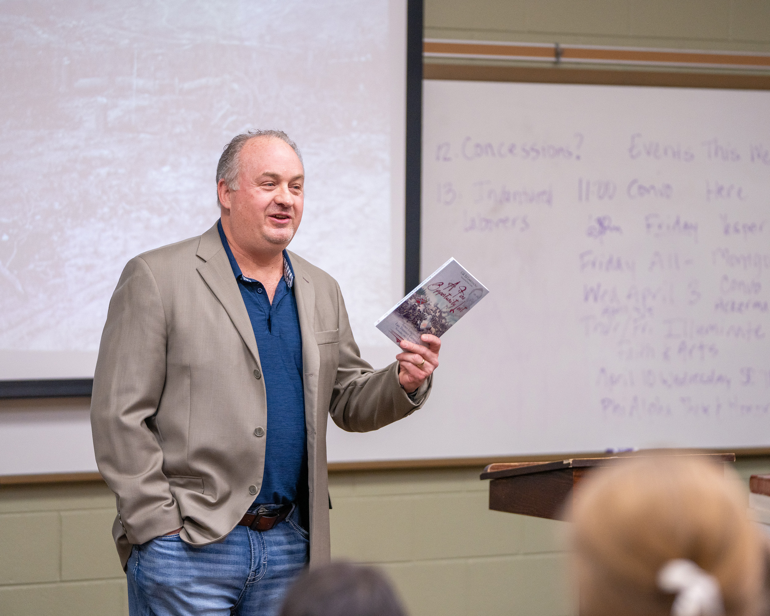 Ed Lowe speaks to students during a history convocation.