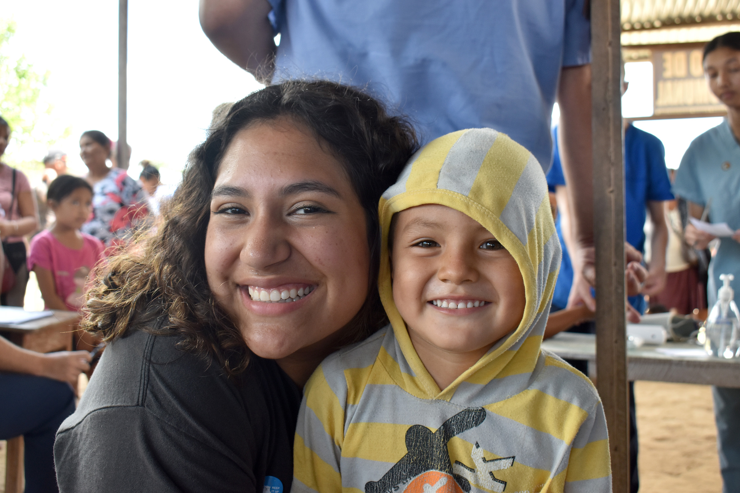 Southern Adventist University student Raquel Lazcano, junior psychology major, smiles with one of the friends she made during a Vision Trip to Peru last year.