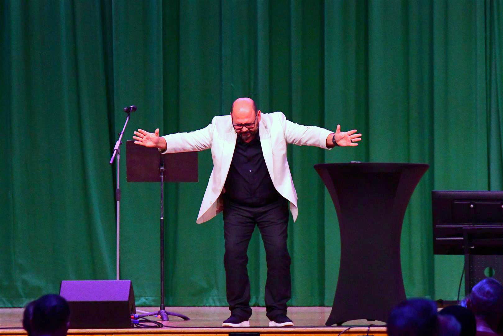 Robert Cornado, pastor of the Chattanooga Hispanic Community Seventh-day Adventist Church, leads out in prayer.